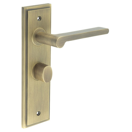 This is an image showing the Frelan - Fitzrovia Door Handle Bathroom Backplate Antique Brass & Turn & Release available to order from T.H. Wiggans Ironmongery in Kendal