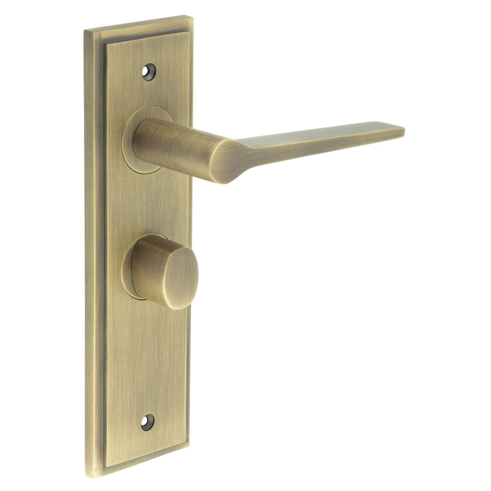 This is an image showing the Frelan - Knightsbridge Door Handle Bathroom Backplate Antique Brass & Turn & Release available to order from T.H. Wiggans Ironmongery in Kendal