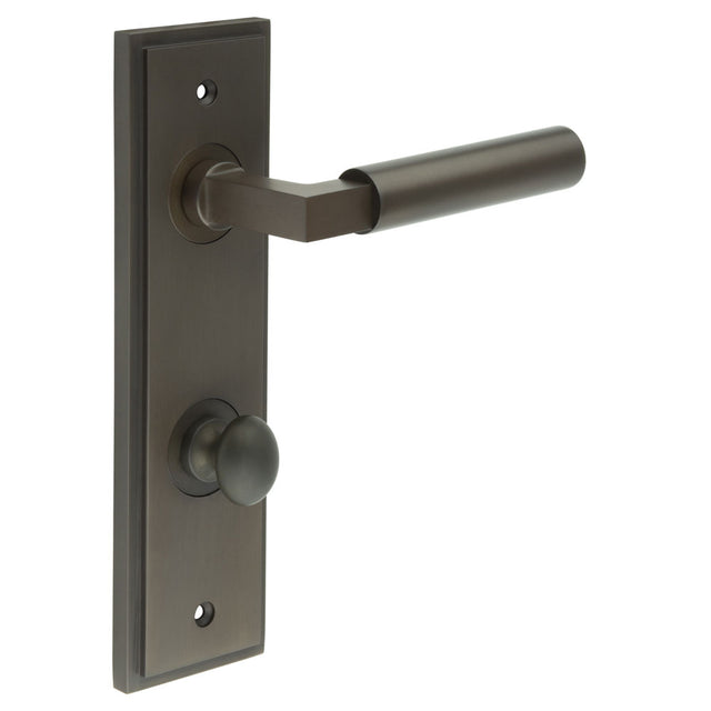 This is an image showing the Frelan - Westminster Door Handle Din Bathroom Backplate Dark Bronze & Turn & Release available to order from T.H. Wiggans Ironmongery in Kendal