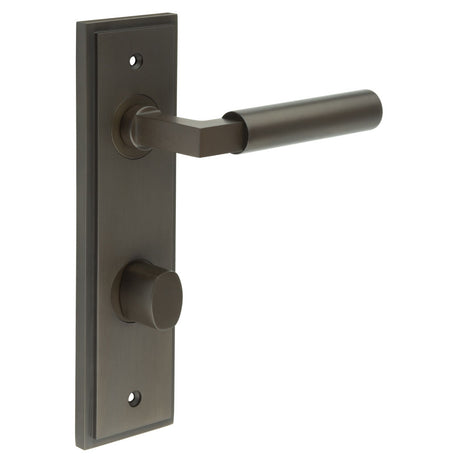 This is an image showing the Frelan - Westminster Door Handle Din Bathroom Backplate Dark Bronze & Turn & Release available to order from T.H. Wiggans Ironmongery in Kendal