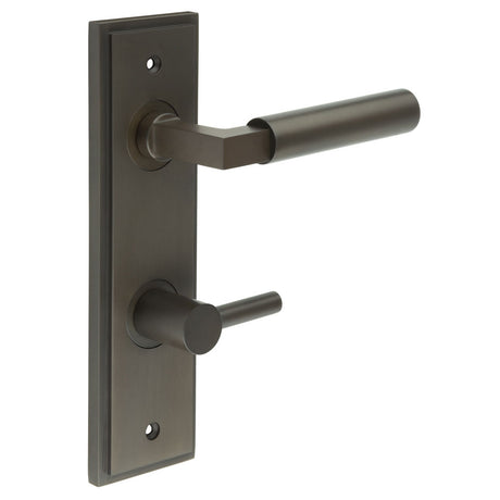 This is an image showing the Frelan - Westminster Door Handle Din Bathroom Backplate Dark Bronze & Turn & Release available to order from T.H. Wiggans Ironmongery in Kendal