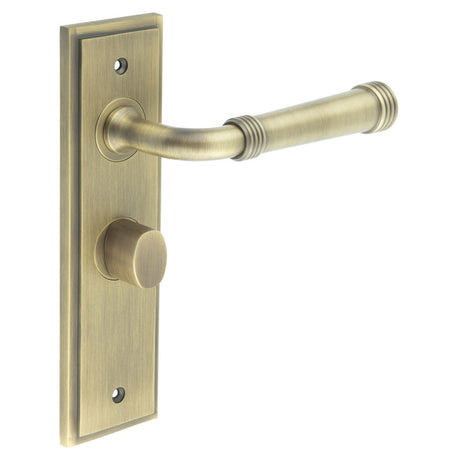 This is an image showing the Frelan - Highgate Door Handle Bathroom Backplate Antique Brass & Turn & Release available to order from T.H. Wiggans Ironmongery in Kendal