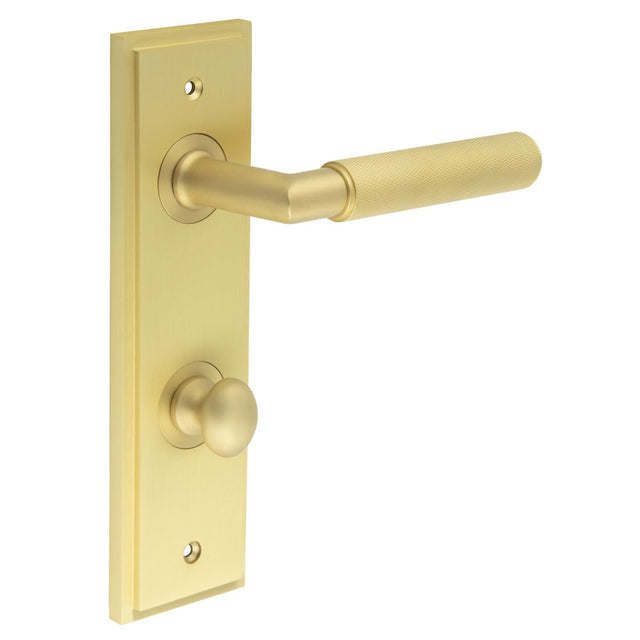 This is an image showing the Frelan - Piccadilly Door Handle Bathroom Din Backplate Satin Brass & Turn & Release available to order from T.H. Wiggans Ironmongery in Kendal