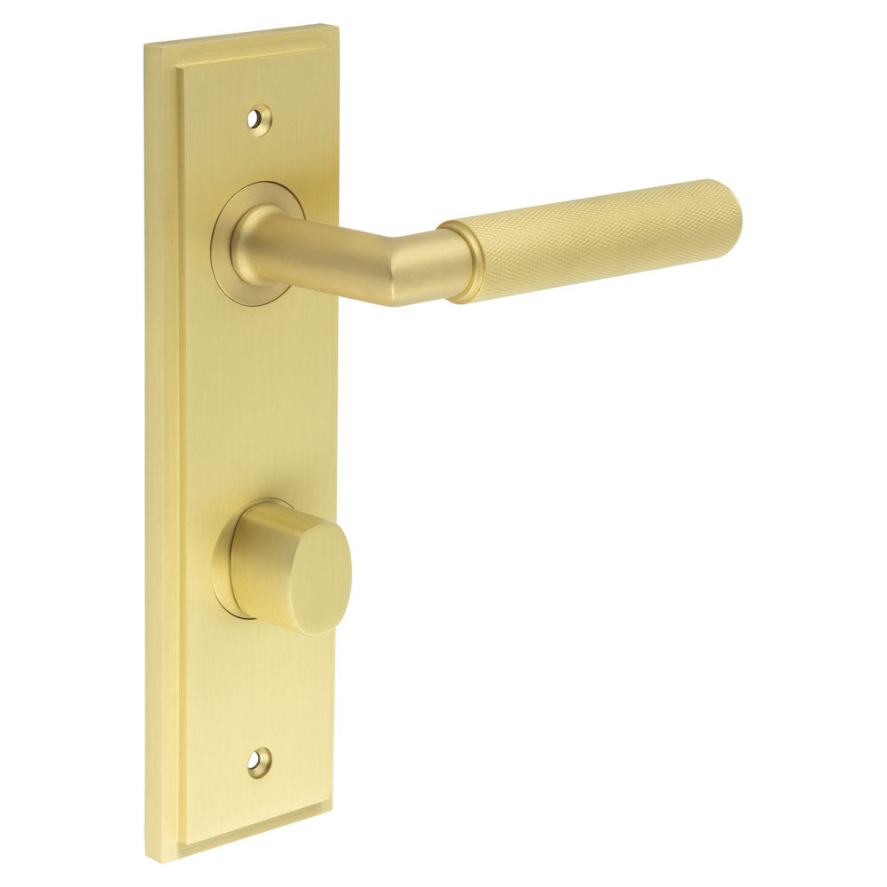 This is an image showing the Frelan - Piccadilly Door Handle Bathroom Din Backplate Satin Brass & Turn & Release available to order from T.H. Wiggans Ironmongery in Kendal