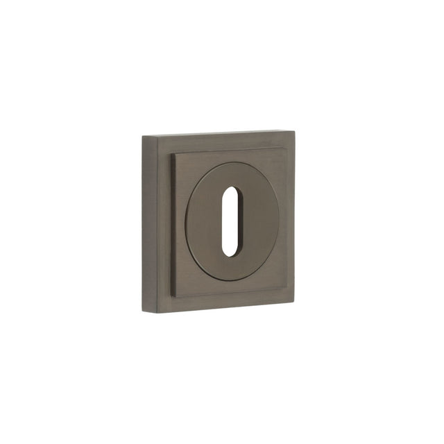 This is an image showing the Frelan - Burlington Standard Keyway Escutcheons Square Stepped Rose Dark Bronze available to order from T.H. Wiggans Ironmongery in Kendal