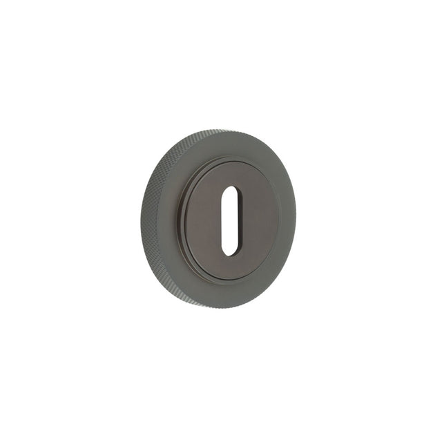 This is an image showing the Frelan - Burlington Standard Keyway Escutcheons Knurled Rose Dark Bronze available to order from T.H. Wiggans Ironmongery in Kendal