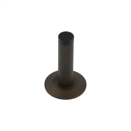 This is an image showing the Frelan - Burlington Knurled Wall Mounted Door Stop Chamfered Rose Dark Bronze available to order from T.H. Wiggans Ironmongery in Kendal