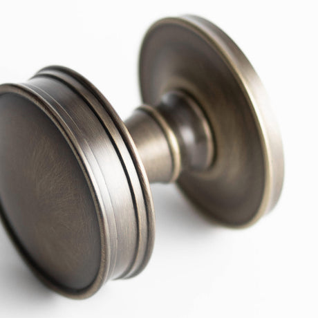 This is an image showing the Burlington - Berkeley Mortice knob - Antique Brass available to order from T.H. Wiggans Ironmongery in Kendal