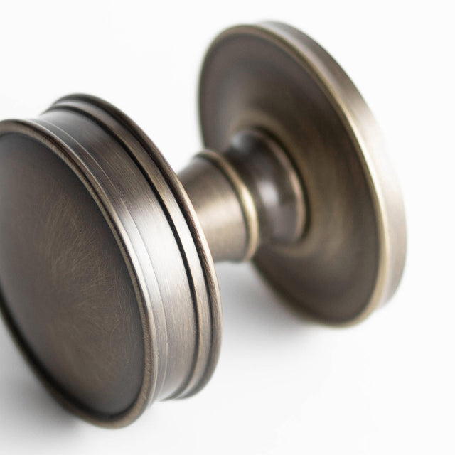 This is an image showing the Burlington - Berkeley Mortice knob - Antique Brass available to order from T.H. Wiggans Ironmongery in Kendal