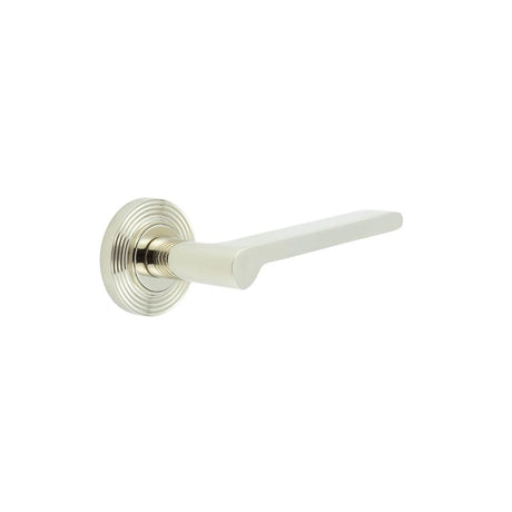 This is an image showing the Frelan - Fitzrovia Door Handles Reeded Rose Polished Nickel available to order from T.H. Wiggans Ironmongery in Kendal