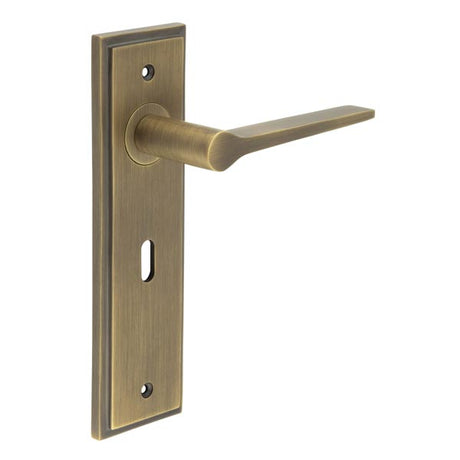 This is an image showing the Frelan - Knightbridge Door Handle Lock Backplate Antique Brass available to order from T.H. Wiggans Ironmongery in Kendal