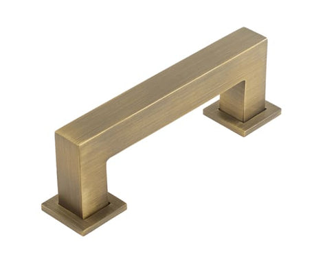 This is an image showing the Burlington - Trafalgar Cabinet Handle 96mm CTC - Antique Brass available to order from T.H. Wiggans Ironmongery in Kendal