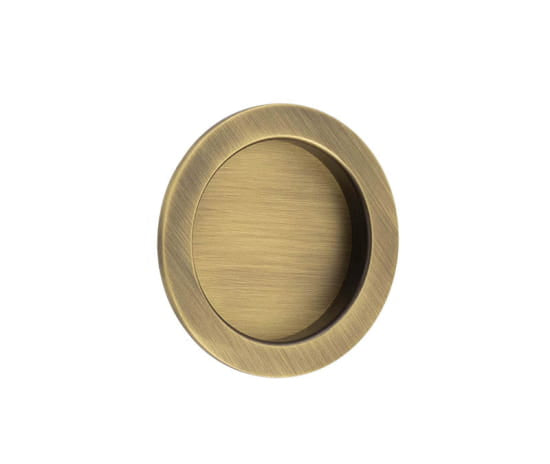 This is an image showing the Burlington - 65x12x3mm AB round concealed flush pull available to order from T.H. Wiggans Ironmongery in Kendal