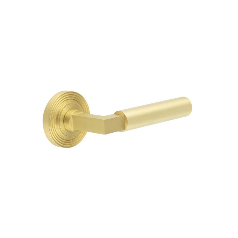 This is an image showing the Frelan - Westminster Door Handles Reeded Rose Satin Brass available to order from T.H. Wiggans Ironmongery in Kendal