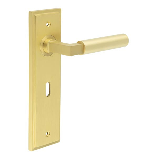 This is an image showing the Frelan - Westminster Door Handle Lock Backplate Satin Brass available to order from T.H. Wiggans Ironmongery in Kendal