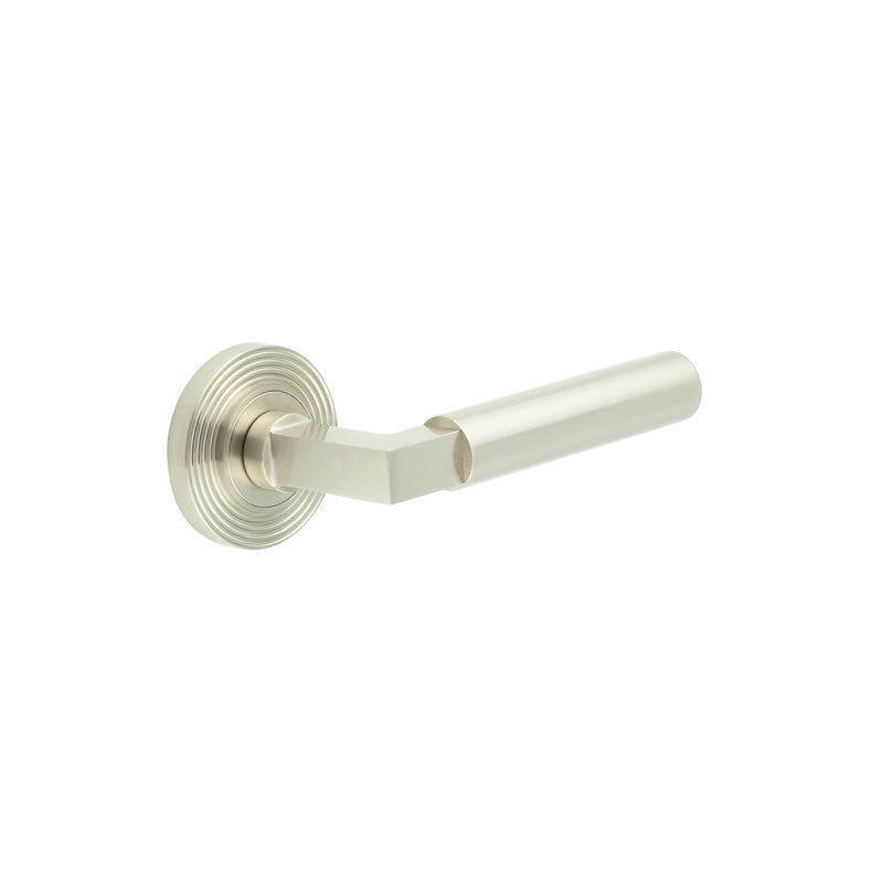 This is an image showing the Frelan - Westminster Door Handles Reeded Rose Satin Nickel available to order from T.H. Wiggans Ironmongery in Kendal