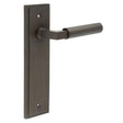 This is an image showing the Frelan - Westminster Door Handle Latch Backplate Dark Bronze available to order from T.H. Wiggans Ironmongery in Kendal