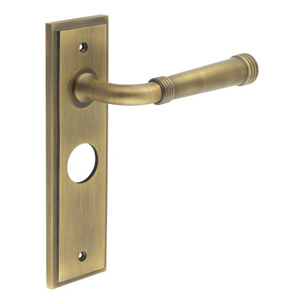 This is an image showing the Frelan - Highgate Door Handle Bathroom Backplate Antique Brass available to order from T.H. Wiggans Ironmongery in Kendal