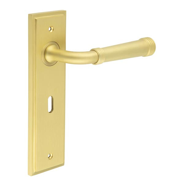 This is an image showing the Frelan - Highgate Door Handle Lock Backplate Satin Brass available to order from T.H. Wiggans Ironmongery in Kendal