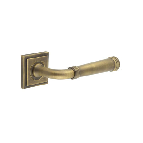 This is an image showing the Frelan - Highgate Door Handles Square Stepped Rose Antique Brass available to order from T.H. Wiggans Ironmongery in Kendal