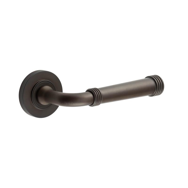 This is an image showing the Frelan - Highgate Door Handles Plain Rose Dark Bronze available to order from T.H. Wiggans Ironmongery in Kendal