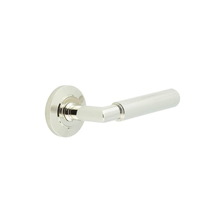 This is an image showing the Frelan - Piccadilly Door Handle on Chamfered Rose Polished Nickel available to order from T.H. Wiggans Ironmongery in Kendal