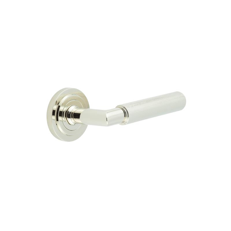 This is an image showing the Frelan - Piccadilly Door Handle on Stepped Rose Polished Nickel available to order from T.H. Wiggans Ironmongery in Kendal