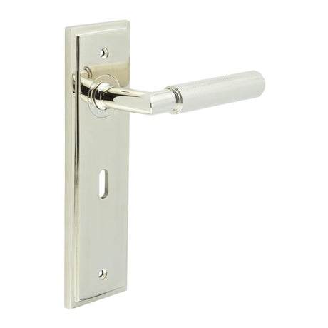 This is an image showing the Frelan - Piccadilly Door Handle Lock Backplate Polished Nickel available to order from T.H. Wiggans Ironmongery in Kendal