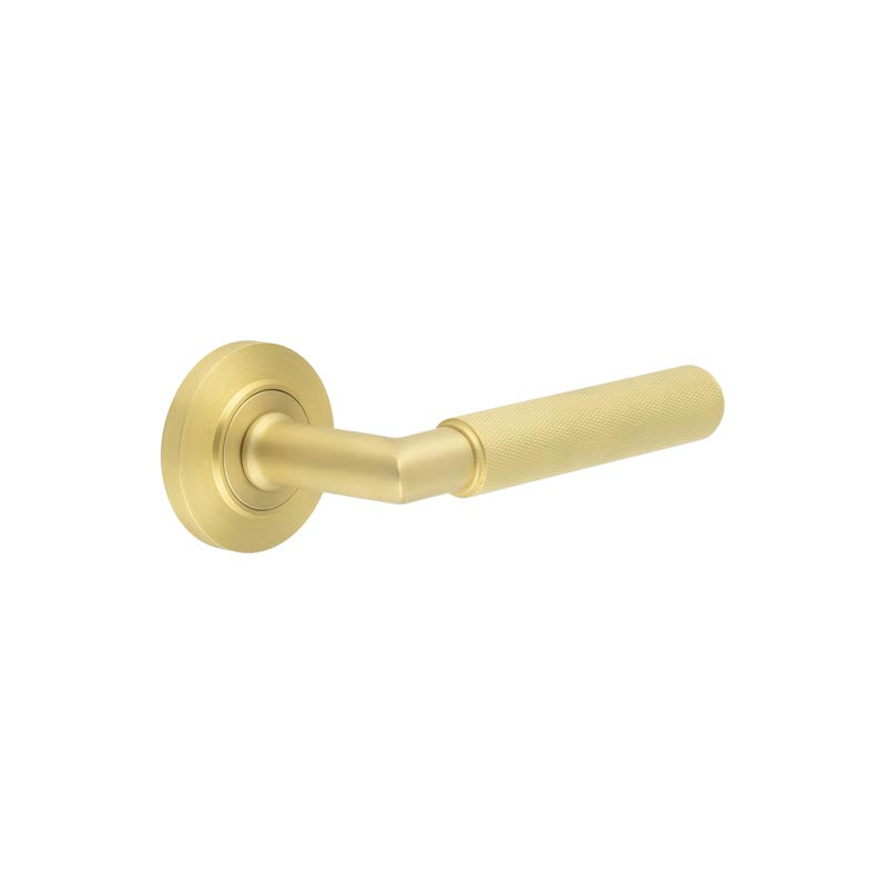 This is an image showing the Frelan - Piccadilly Door Handle on Chamfered Rose Satin Brass available to order from T.H. Wiggans Ironmongery in Kendal