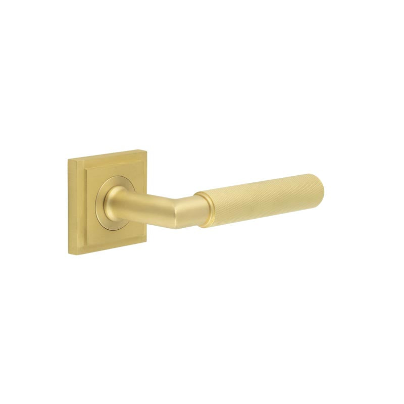 This is an image showing the Frelan - Piccadilly Door Handle on Square Stepped Rose Satin Brass available to order from T.H. Wiggans Ironmongery in Kendal