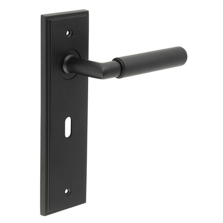 This is an image showing the Frelan - Piccadilly Door Handle Lock Backplate Black available to order from T.H. Wiggans Ironmongery in Kendal