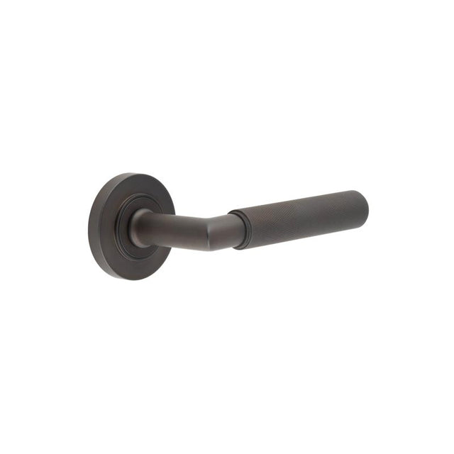 This is an image showing the Frelan - Piccadilly Door Handle on Plain Rose Dark Bronze available to order from T.H. Wiggans Ironmongery in Kendal