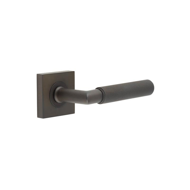 This is an image showing the Frelan - Piccadilly Door Handle on Square Plain Rose Dark Bronze available to order from T.H. Wiggans Ironmongery in Kendal