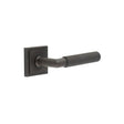 This is an image showing the Frelan - Piccadilly Door Handle on Square Stepped Rose Dark Bronze available to order from T.H. Wiggans Ironmongery in Kendal