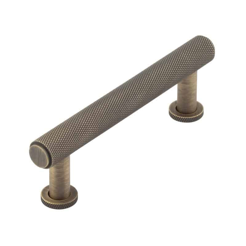 This is an image showing the Burlington - Piccadilly Cabinet Handle 96mm CTC - Antique Brass available to order from T.H. Wiggans Ironmongery in Kendal