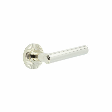 This is an image showing the Frelan - Richmond Door Handles Reeded Rose Polished Nickel available to order from T.H. Wiggans Ironmongery in Kendal