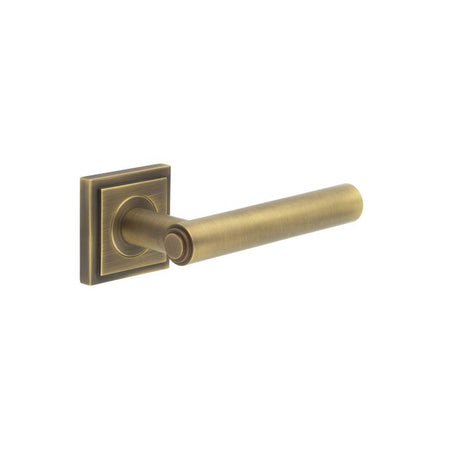 This is an image showing the Frelan - Richmond Door Handles Square Stepped Antique Brass available to order from T.H. Wiggans Ironmongery in Kendal