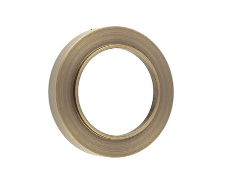 This is an image showing the Burlington - Plain outer rose for Esc - Antique Brass available to order from T.H. Wiggans Ironmongery in Kendal