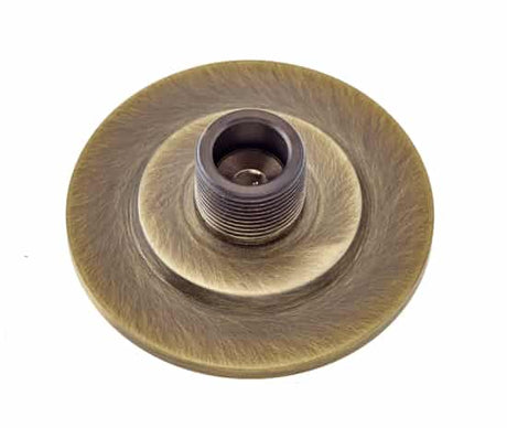 This is an image showing the Burlington - Stepped door stop base - Antique Brass available to order from T.H. Wiggans Ironmongery in Kendal