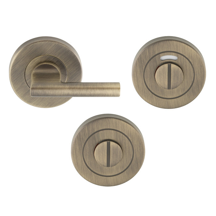 This is an image of Eurospec - Disabled Thumbturn & Release - Antique Brass - CST1025AB available to order from T.H. Wiggans Ironmongery in Kendal.