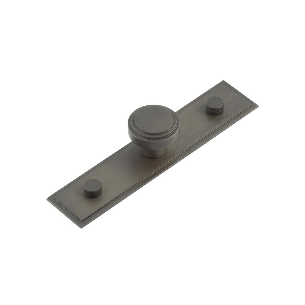 This is an image showing the Frelan - Cropley Cupboard Knobs 30mm Stepped Backplate Dark Bronze available to order from T.H. Wiggans Ironmongery in Kendal