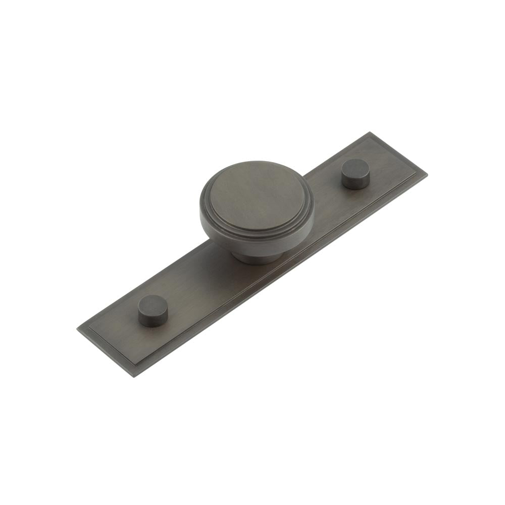 This is an image showing the Frelan - Cropley Cupboard Knobs 40mm Stepped Backplate Dark Bronze available to order from T.H. Wiggans Ironmongery in Kendal