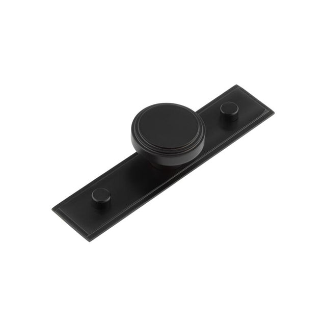 This is an image showing the Frelan - Cropley Cupboard Knobs 40mm Stepped Backplate Black available to order from T.H. Wiggans Ironmongery in Kendal