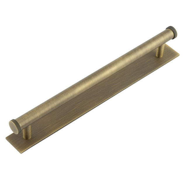 This is an image showing the Frelan - Hoxton Wenlock Cabinet Handles 224mm Ctrs Plain Backplate Antique Brass available to order from T.H. Wiggans Ironmongery in Kendal