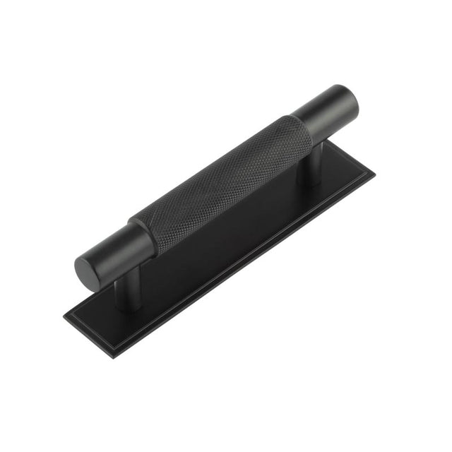 This is an image showing the Frelan - Hoxton Taplow Cabinet Handles 96mm Ctrs Stepped Backplate Matt Black available to order from T.H. Wiggans Ironmongery in Kendal