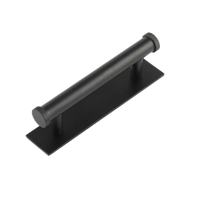 This is an image showing the Frelan - Hoxton Thaxted Cabinet Handles 96mm Ctrs Plain Backplate Matt Black available to order from T.H. Wiggans Ironmongery in Kendal