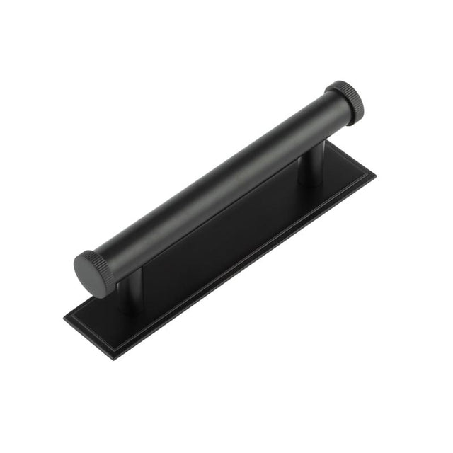 This is an image showing the Frelan - Hoxton Thaxted Cabinet Handles 96mm Ctrs Stepped Backplate Matt Black available to order from T.H. Wiggans Ironmongery in Kendal