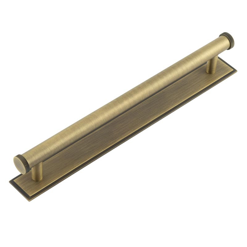 This is an image showing the Frelan - Hoxton Thaxted Cabinet Handles 224mm Ctrs Stepped Backplate Antique Brass available to order from T.H. Wiggans Ironmongery in Kendal