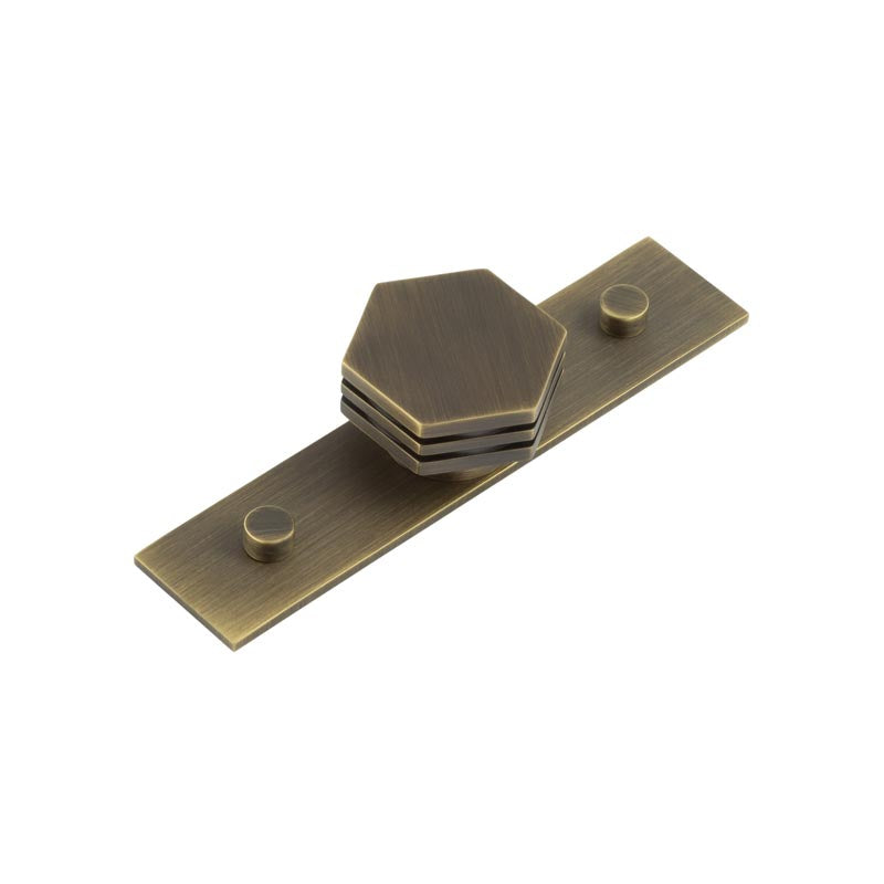 This is an image showing the Frelan - Nile Cupboard Knobs 40mm Plain Antique Brass available to order from T.H. Wiggans Ironmongery in Kendal