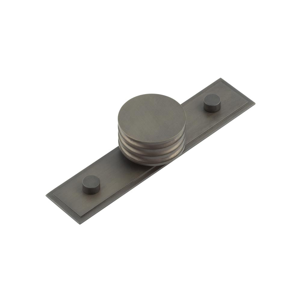 This is an image showing the Frelan - Sturt Cupboard Knobs 40mm Stepped Dark Bronze available to order from T.H. Wiggans Ironmongery in Kendal